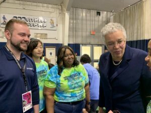 Cook County Board President Toni Preckwinkle engages with students at Governors State University during the SouthWorks Engineering and Robotics Olympics. This program is one of many initiatives supported by Cook County to foster innovation and talent in manufacturing and engineering.